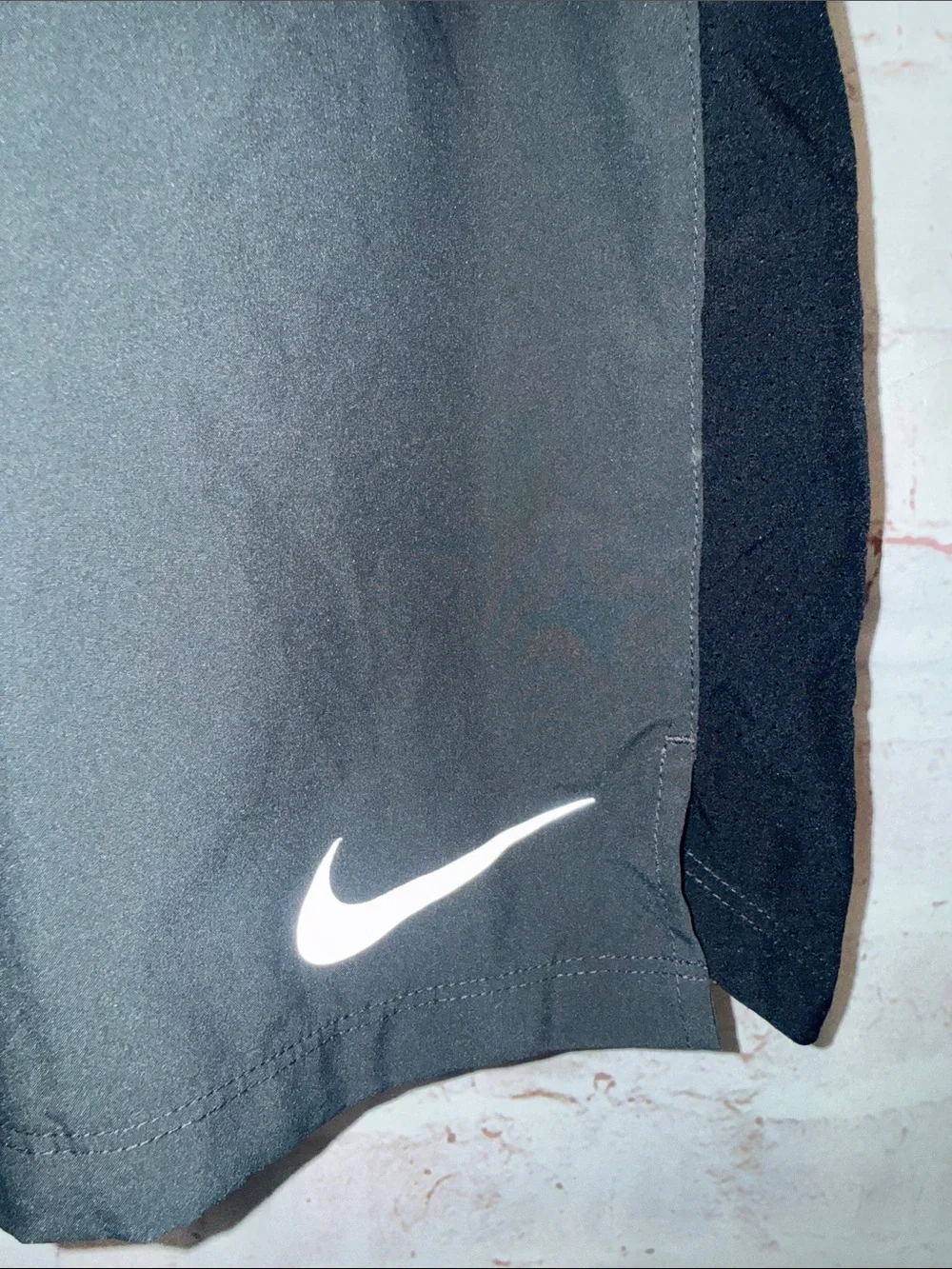 Nike Men's Gray Athletic Shorts Black Side Panels White Swoosh Dri fit pockets
